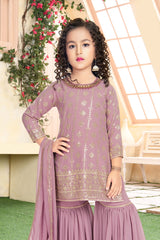 Pale pink color golden embroidered ethnic wear Sharara suit for girls.